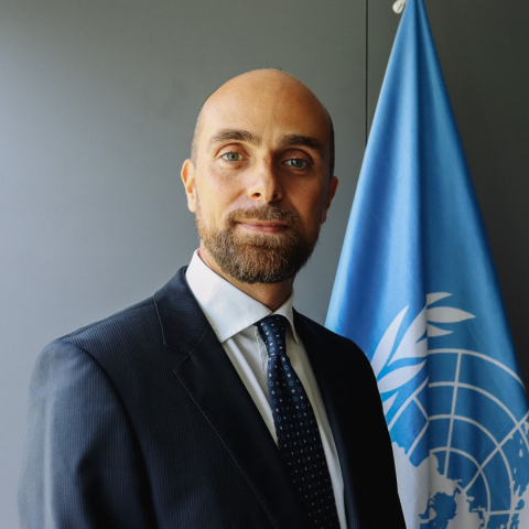 Cristiano Franchi profile photo in front of UN flag